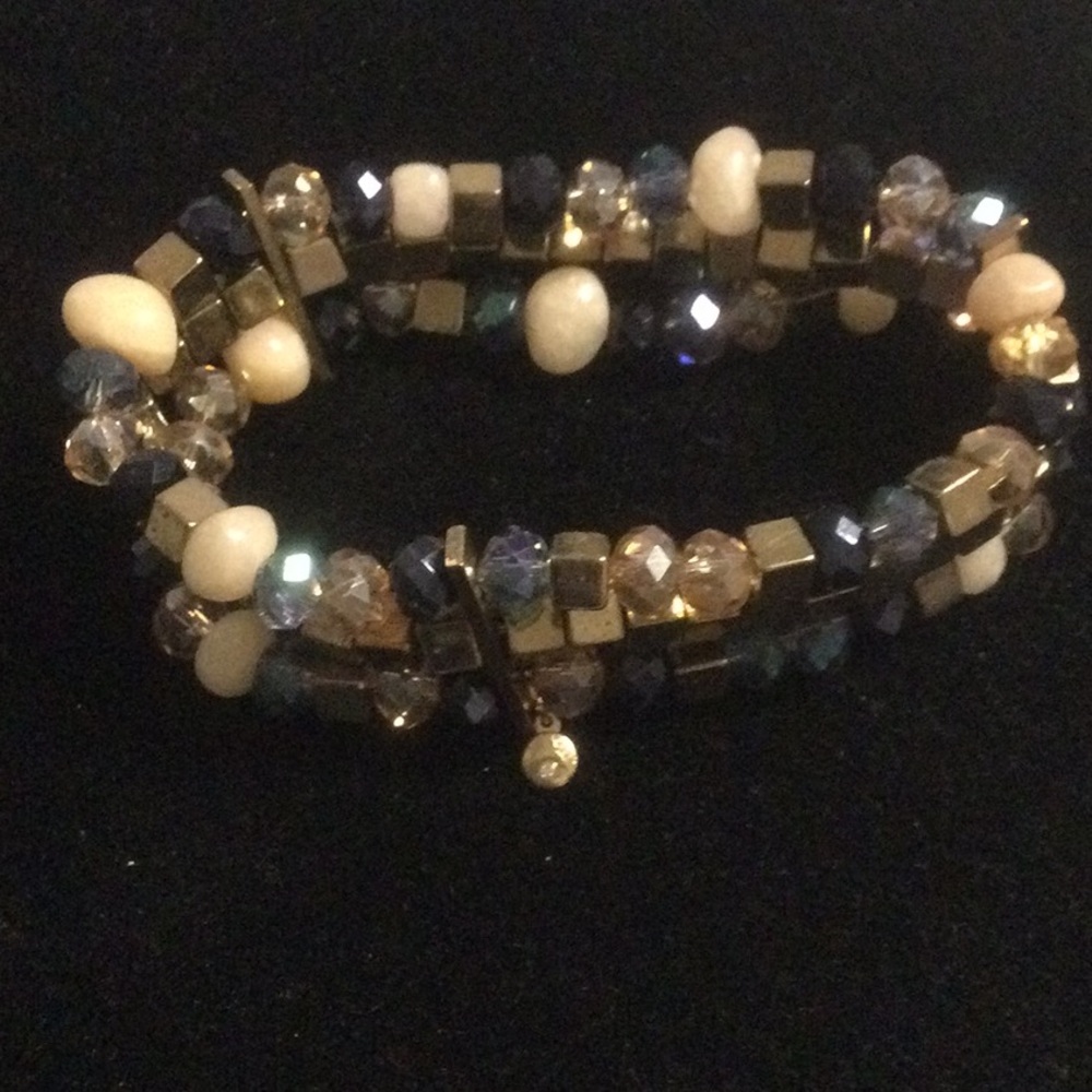 Elegant Beaded Bracelet with Blue and Cream Accents